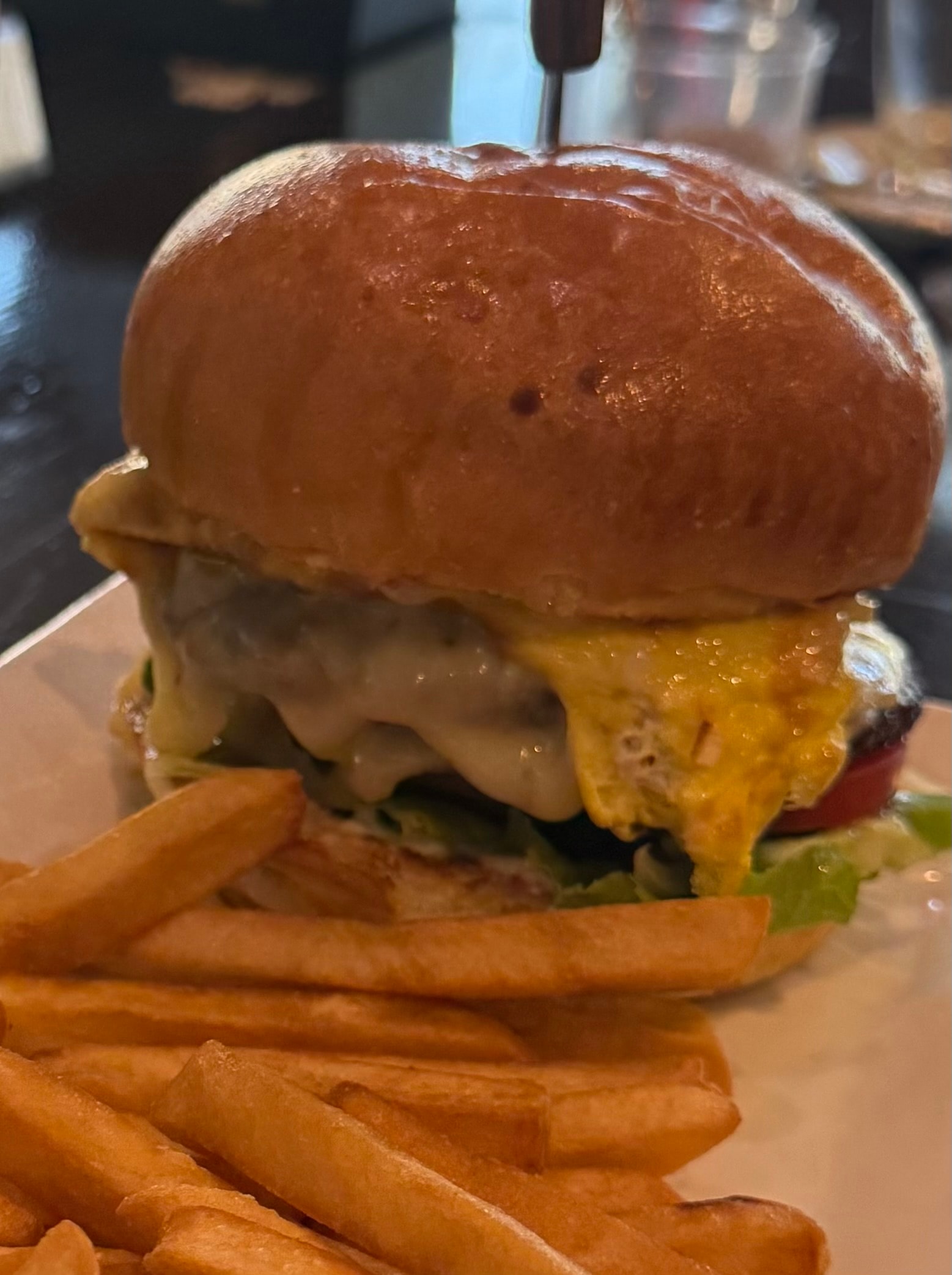 Juicy cheeseburger with golden fries