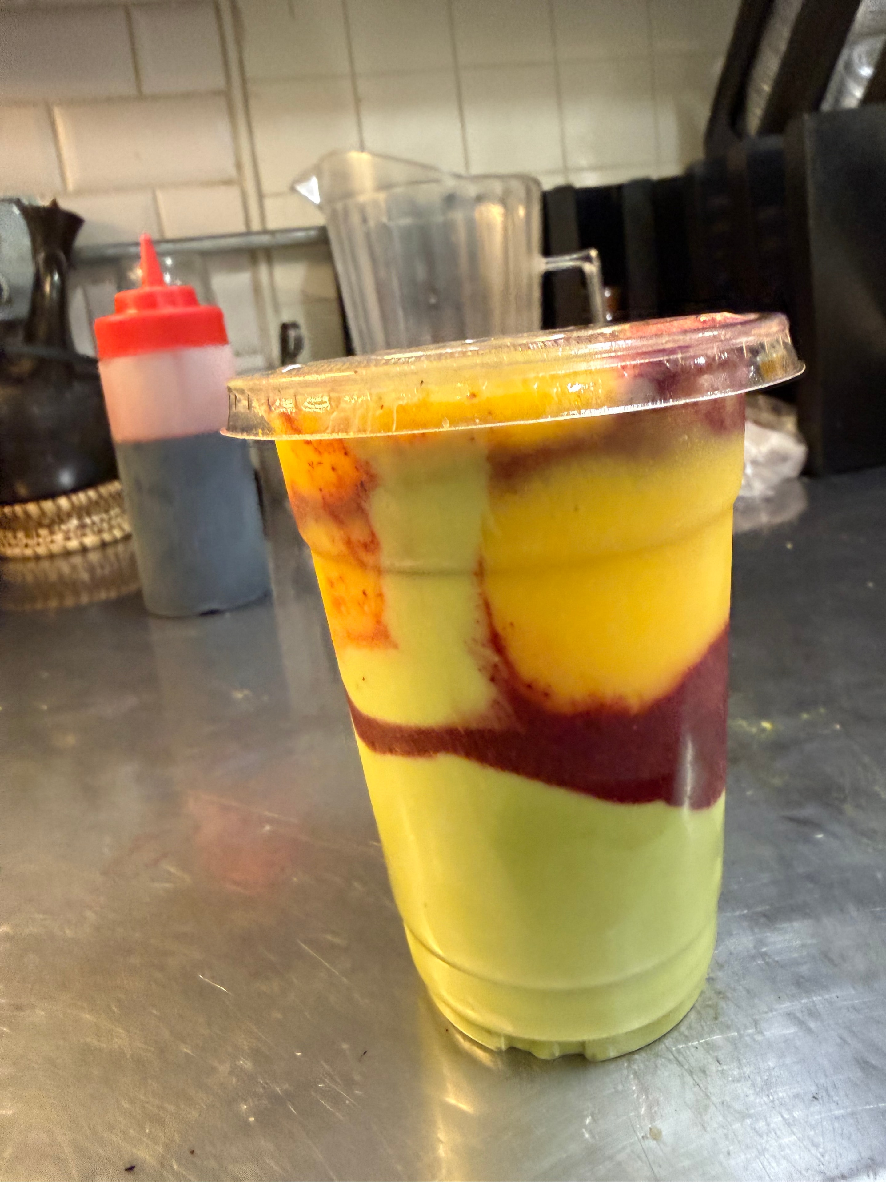 Layered specialty drink with vibrant colors